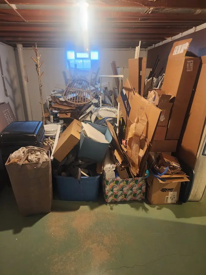 Roll-off dumpster container at job site for 15 Yard Dumpster Rental in Montrose